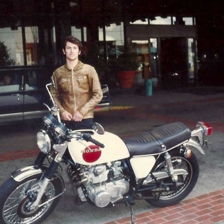 Zach as a young man with his motorcycle.